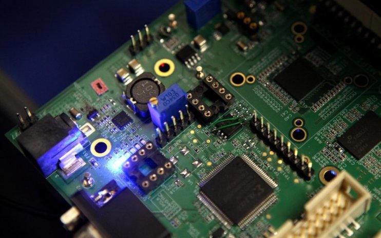 Chip supplier IQE has reported lower revenue as the global phone market is still cool and weak supply chains are yet to recover from the pandemic, but an Asian expansion provides glimmer of hope.