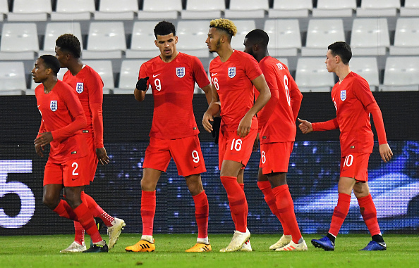 FERRARA, ITALY - NOVEMBER 15: Dominic Solanke #9 of England u21 celebrates with teammates after scoring his team second goal during the International friendly match between Italy U21 and England U21 on November 15, 2018 in Ferrara, Italy. (Photo by Alessandro Sabattini/Getty Images)
