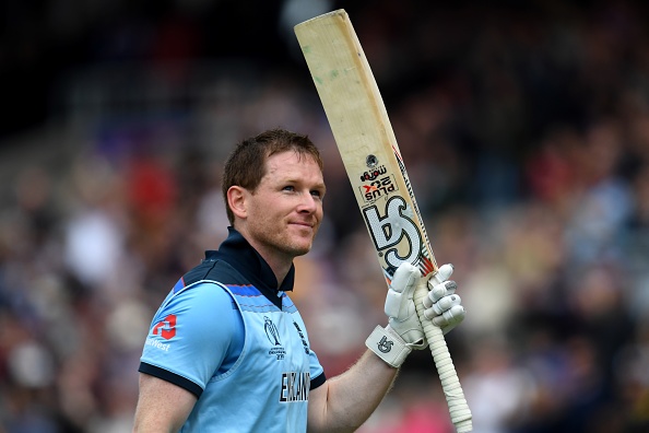 England's captain Eoin Morgan acknowledges the crowd as he walks back the pavilion after losing his wicket for 148 runs during the 2019 Cricket World Cup group stage match between England and Afghanistan at Old Trafford in Manchester, northwest England, on June 18, 2019. (Photo by Dibyangshu SARKAR / AFP) / RESTRICTED TO EDITORIAL USE (Photo credit should read DIBYANGSHU SARKAR/AFP/Getty Images)