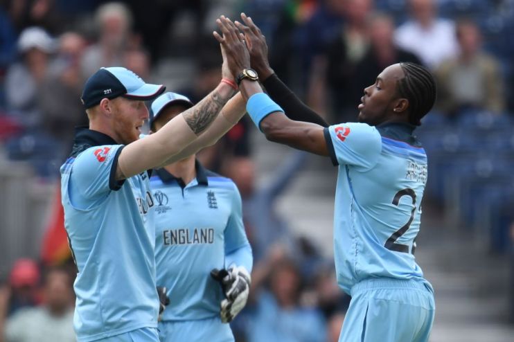 England's Jofra Archer (R) celebrates taking the wicket of Afghanistan's Rashid Khan during the 2019 Cricket World Cup group stage match between England and Afghanistan at Old Trafford in Manchester, northwest England, on June 18, 2019. (Photo by Dibyangshu SARKAR / AFP) / RESTRICTED TO EDITORIAL USE (Photo credit should read DIBYANGSHU SARKAR/AFP/Getty Images)