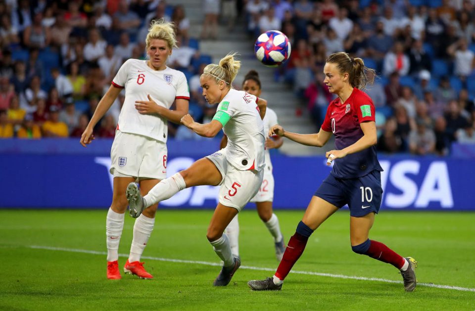 LE HAVRE, FRANCE - JUNE 27: Steph Houghton of England clears the ball under pressure from Caroline Graham Hansen of Norway during the 2019 FIFA Women's World Cup France Quarter Final match between Norway and England at Stade Oceane on June 27, 2019 in Le Havre, France. (Photo by Richard Heathcote/Getty Images)