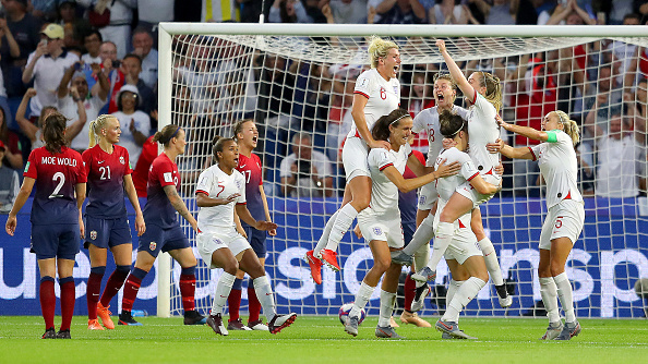 LE HAVRE, FRANCE - JUNE 27: Lucy Bronze of England celebrates with teammates after scoring her team's third goal during the 2019 FIFA Women's World Cup France Quarter Final match between Norway and England at Stade Oceane on June 27, 2019 in Le Havre, France. (Photo by Richard Heathcote/Getty Images)