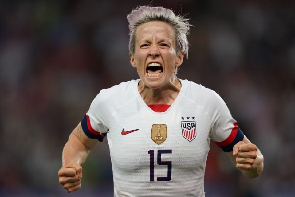 TOPSHOT - United States' forward Megan Rapinoe celebrates after scoring a goal during the France 2019 Women's World Cup quarter-final football match between France and USA, on June 28, 2019, at the Parc des Princes stadium in Paris. (Photo by Lionel BONAVENTURE / AFP) (Photo credit should read LIONEL BONAVENTURE/AFP/Getty Images)