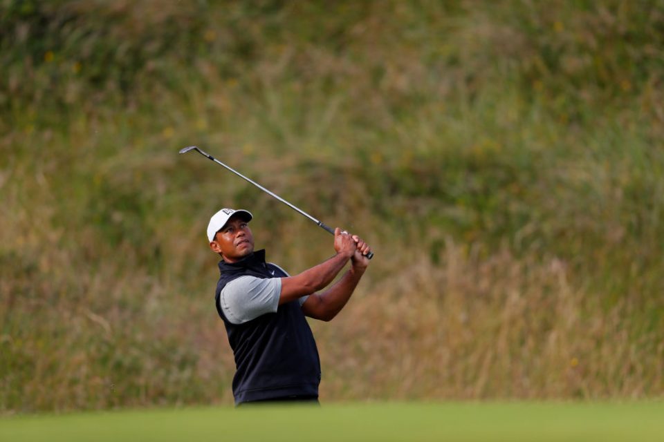 PORTRUSH, NORTHERN IRELAND - JULY 16: Tiger Woods of the United States plays a shot during a practice round prior to the 148th Open Championship held on the Dunluce Links at Royal Portrush Golf Club on July 16, 2019 in Portrush, United Kingdom. (Photo by Kevin C. Cox/Getty Images)