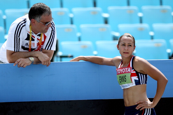 DAEGU, SOUTH KOREA - AUGUST 30: Jessica Ennis of Great Britain talks to coach Toni Minichiello during the javelin throw in the women's heptathlon during day four of the 13th IAAF World Athletics Championships at the Daegu Stadium on August 30, 2011 in Daegu, South Korea. (Photo by Michael Steele/Getty Images)