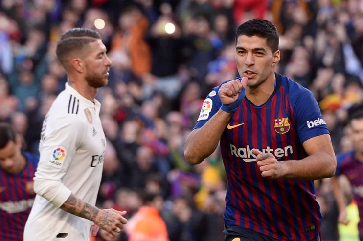 Barcelona's Uruguayan forward Luis Suarez celebrates scoring his team's second goal during the Spanish league football match between FC Barcelona and Real Madrid CF at the Camp Nou stadium in Barcelona on October 28, 2018. (Photo by Josep LAGO / AFP) (Photo credit should read JOSEP LAGO/AFP/Getty Images)