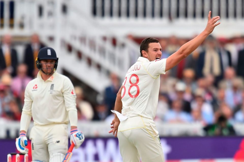 Australia's Josh Hazlewood (R) celebrates taking the wicket of England's Jason Roy (L) for 0 runs on the second day of the second Ashes cricket Test match between England and Australia at Lord's Cricket Ground in London on August 15, 2019. (Photo by Glyn KIRK / AFP) / RESTRICTED TO EDITORIAL USE. NO ASSOCIATION WITH DIRECT COMPETITOR OF SPONSOR, PARTNER, OR SUPPLIER OF THE ECB (Photo credit should read GLYN KIRK/AFP/Getty Images)