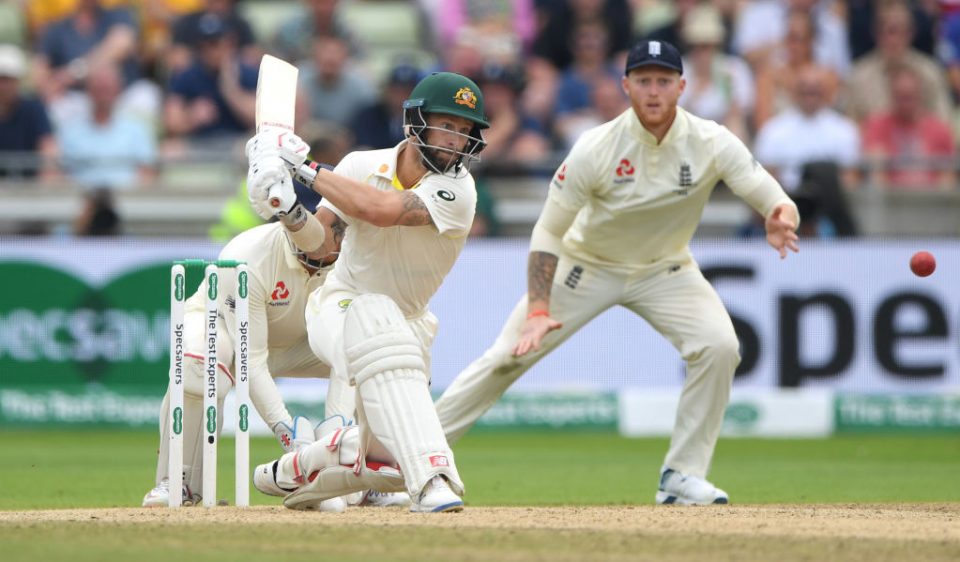 BIRMINGHAM, ENGLAND - AUGUST 04: Australia batsman Matthew Wade reverse sweeps watched by Jonny Bairstow during day four of the First Specsavers Test Match between England and Australia at Edgbaston on August 04, 2019 in Birmingham, England. (Photo by Stu Forster/Getty Images)