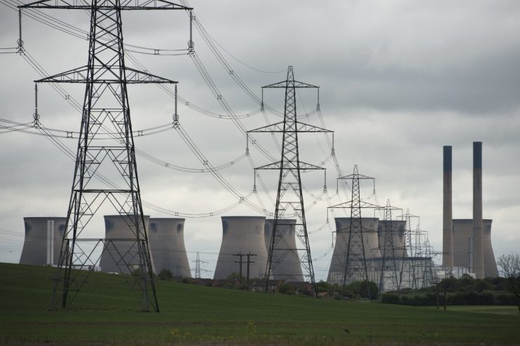 A general view shows pylons and Ferrybridge C power station, owned by energy company SSE, which is set to stop generating and close in March 2016, near Knottingley, northern England, on May 24, 2015. The coal-fired powerstation went online in 1966. AFP PHOTO / OLI SCARFF (Photo credit should read OLI SCARFF/AFP/Getty Images)