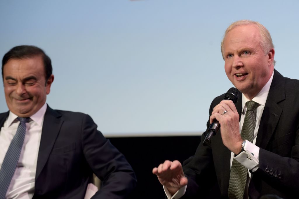 French Renault group CEO and chairman of Japan's Nissan Motor CO. Ltd and Mitsubishi Motors Corp, Carlos Ghosn (L) and British Petroleum (BP) Chief Executive Bob Dudley (R) attend a conference during the event "Tomorrow in Motion" on October 1st, 2018 on the eve of the first press day of the Paris Motor Show in Paris. (Photo by ERIC PIERMONT / AFP)        (Photo credit should read ERIC PIERMONT/AFP/Getty Images)