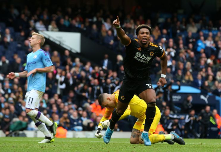MANCHESTER, ENGLAND - OCTOBER 06: Adama Traore of Wolverhampton Wanderers celebrates after scoring his team's first goal during the Premier League match between Manchester City and Wolverhampton Wanderers at Etihad Stadium on October 06, 2019 in Manchester, United Kingdom. (Photo by Alex Livesey/Getty Images)