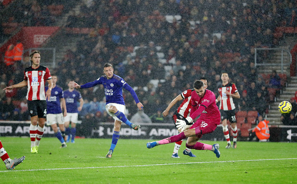SOUTHAMPTON, ENGLAND - OCTOBER 25: Jamie Vardy of Leicster City scores his teams 5th goal past Angus Gunn of Southampton during the Premier League match between Southampton FC and Leicester City at St Mary's Stadium on October 25, 2019 in Southampton, United Kingdom. (Photo by Naomi Baker/Getty Images)