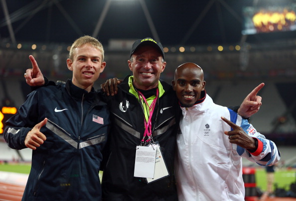 LONDON, ENGLAND - AUGUST 04: (R) Mohamed Farah of Great Britain celebrates winning gold with silver medalist Galen Rupp of the United States and (C) coach Alberto Salazar after the Men's 10,000m Final on Day 8 of the London 2012 Olympic Games at Olympic Stadium on August 4, 2012 in London, England. (Photo by Michael Steele/Getty Images)