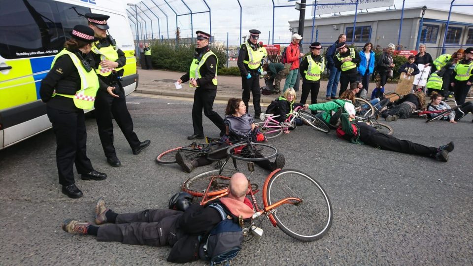 Police arrest Extinction Rebellion protesters trying to block London City Airport's private jet terminal (Jamie Lowe)