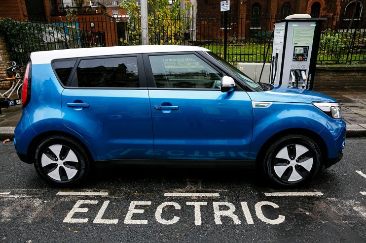 Go Ultra Low Electric Vehicle on charge on a London street