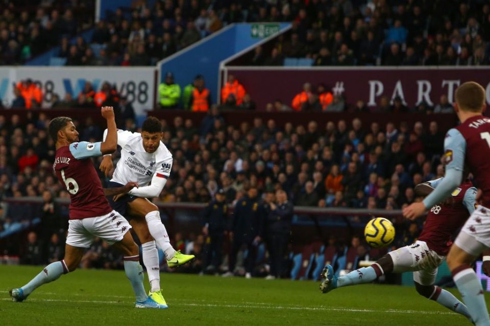 Liverpool's English midfielder Alex Oxlade-Chamberlain (2L) takes a shot at goal during the English Premier League football match between Aston Villa and Liverpool at Villa Park in Birmingham, central England on November 2, 2019. (Photo by GEOFF CADDICK / AFP) / RESTRICTED TO EDITORIAL USE. No use with unauthorized audio, video, data, fixture lists, club/league logos or 'live' services. Online in-match use limited to 120 images. An additional 40 images may be used in extra time. No video emulation. Social media in-match use limited to 120 images. An additional 40 images may be used in extra time. No use in betting publications, games or single club/league/player publications. / (Photo by GEOFF CADDICK/AFP via Getty Images)