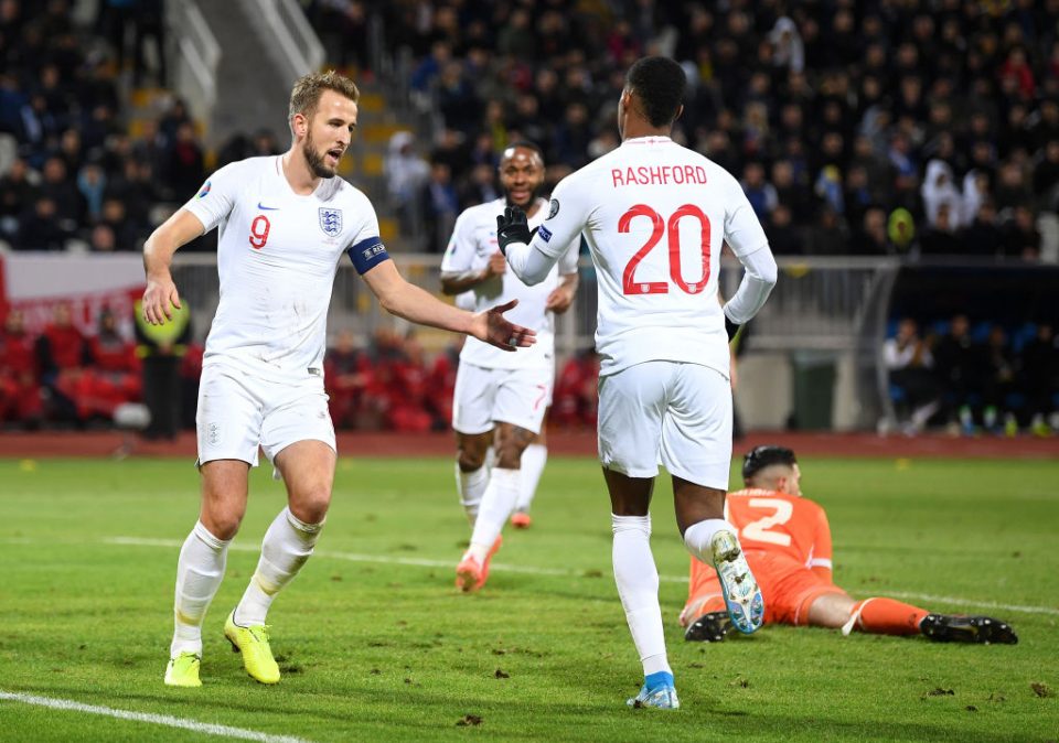 PRISTINA, KOSOVO - NOVEMBER 17: Marcus Rashford of England celebrates scoring his team's third goal with Harry Kane during the UEFA Euro 2020 Qualifier between Kosovo and England at the Pristina City Stadium on November 17, 2019 in Pristina, Kosovo. (Photo by Michael Regan/Getty Images)