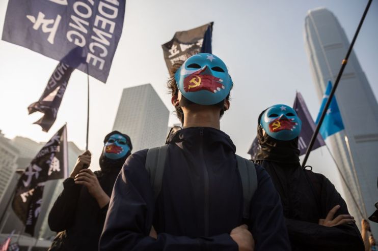 Protesters attend a rally in Hong Kong on Sunday