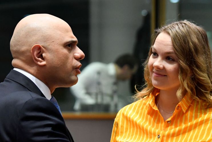 Chancellor Sajid Javid talks with Katri Kulmuni, Finland's finance minister, at today's Ecofin meeting