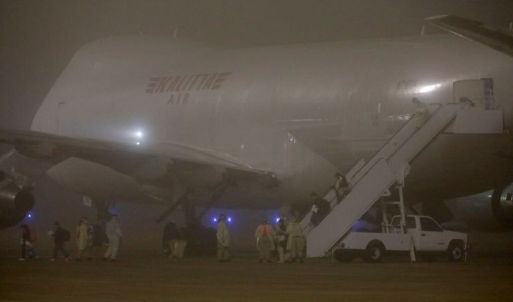 American evacuees from the Diamond Princess cruise ship arrive at a military base in Texas. Those with coronavirus face a military quarantine