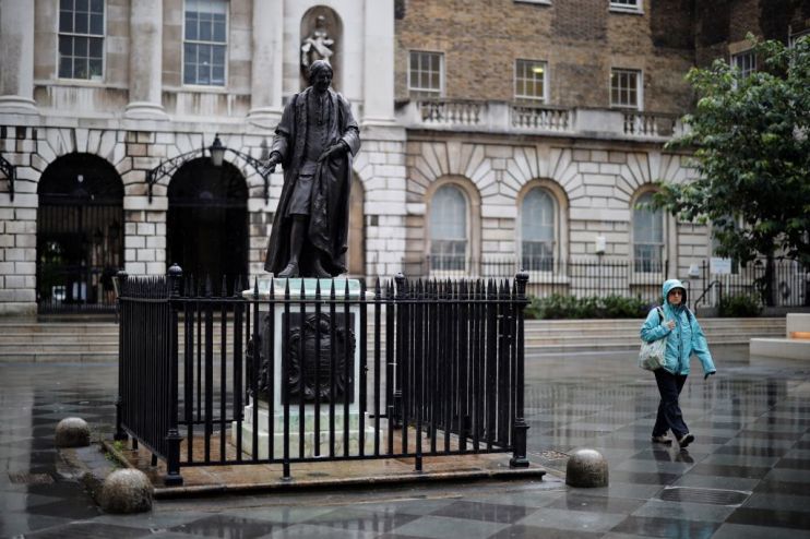 BRITAIN-UNREST-RASCISM-STATUE-GUY