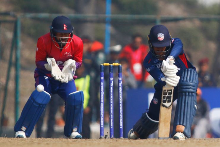 US cricketer Akshay Homraj plays a shot during the one day international cricket match of the ICC Cricket World Cup League 2 against Nepal