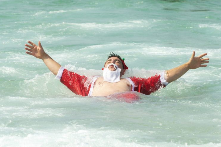 CHRISTMAS-BEACH-VIrUS-TRAVEL-RESTRICTIONS
