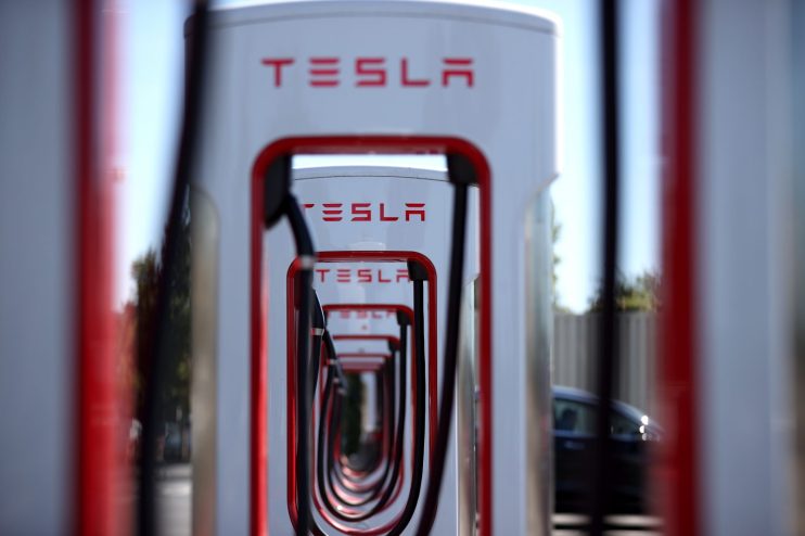Tesla shares jumped 14 per cent yesterday after it was announced that the electric car maker would join the S