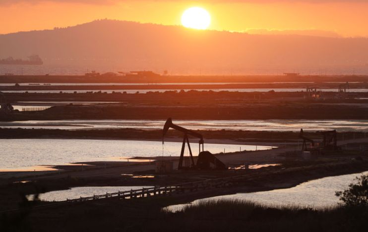 Oil prices rose on Monday to their highest in just over a year, with Brent nudging past $60 a barrel, boosted by supply cuts among key producers
