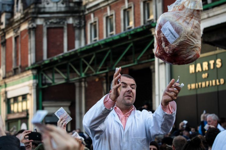 Annual Christmas Eve Meat Sell-off Takes Place At Smithfield Market