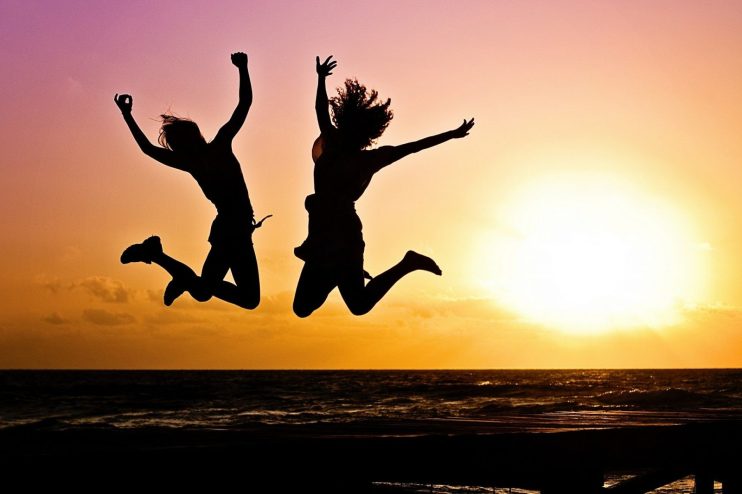 silhouette jump sunset