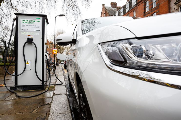 Go Ultra Low Electric Vehicle on charge on a London street