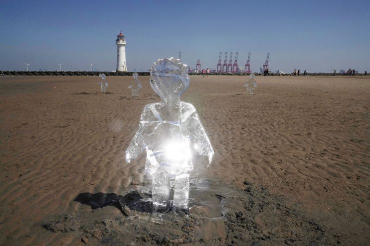 Sand Artwork Highlights Climate Change Ahead Of COP26