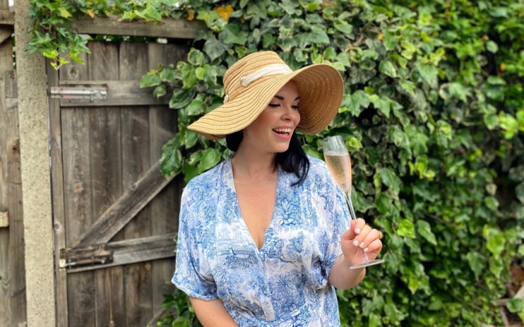 Libby with a glass of Rosé Prosecco