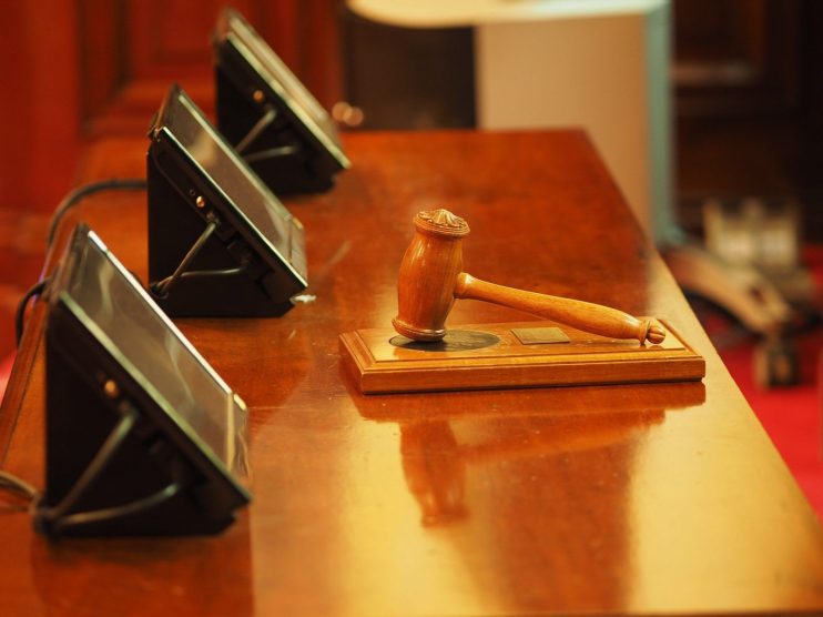 Courthouse gavel and screens
