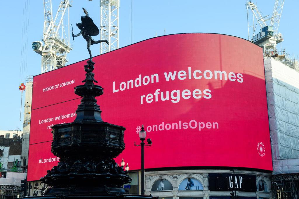 TfL and the Mayor of London launched a messaging campaign across the Tube network and on the screens in Piccadilly Circus to welcome Afghan refugees. (Photo by Joe Maher/Getty Images)