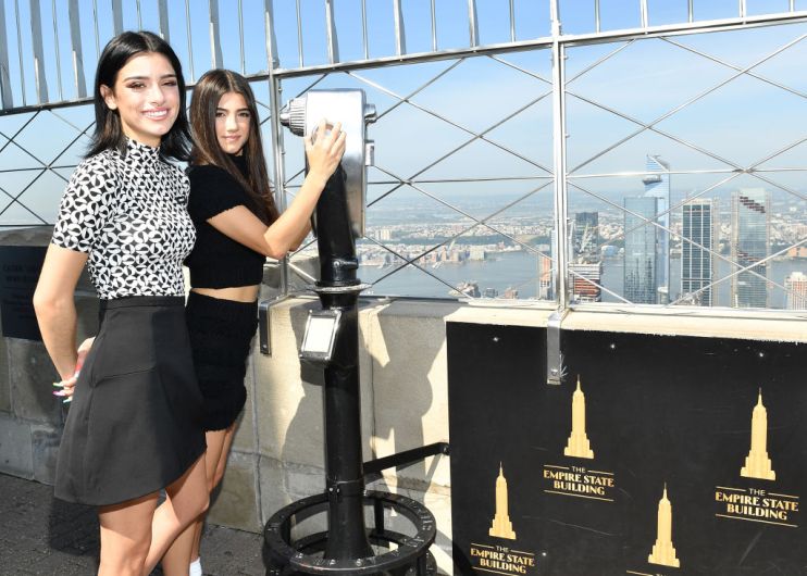 TikTok Stars Charli And Dixie D'Amelio Visit The World-Famous Empire State Building