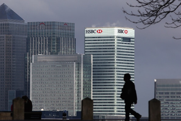 A former HSBC executive is suing four top bosses including former CEO John Flint