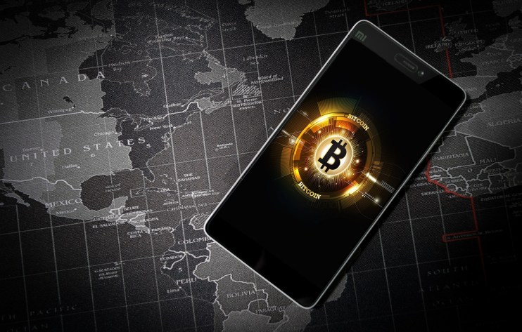 Bitcoin will be adopted as legal tender in three more countries in 2022, predicts the CEO of a global financial giant.