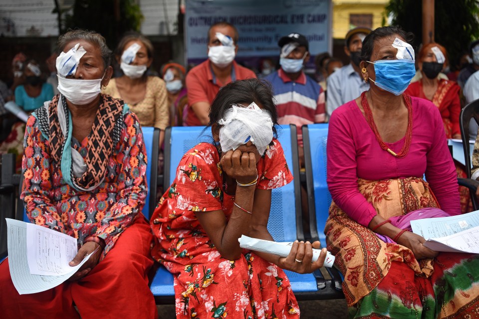 Patients outside the outreach camp set up by the TKRF in Nepal.