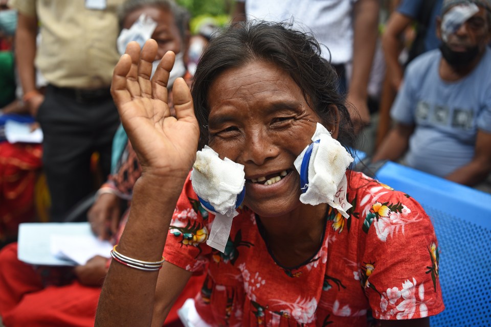 A smiling patient after receiving cataract surgery.
