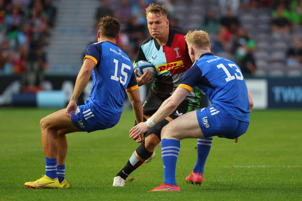 Former BUCS star Alex Dombrandt carrying a rugby ball
