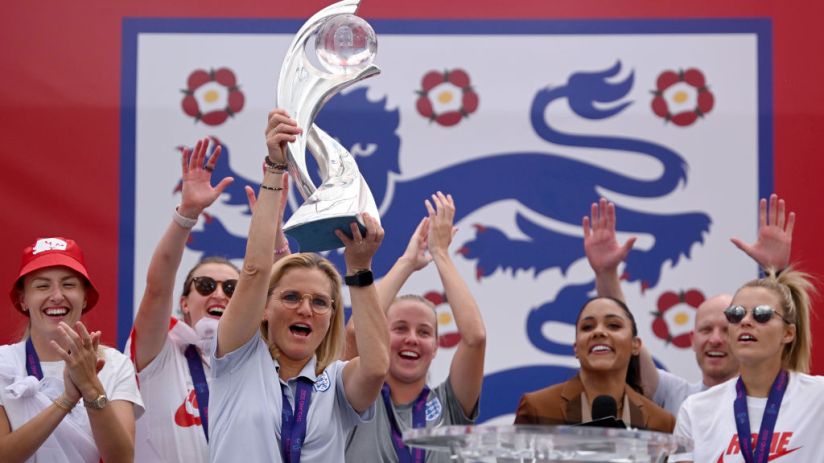 The Lionesses Lift The UEFA Women's Euro Trophy In Victory Celebration For Fans