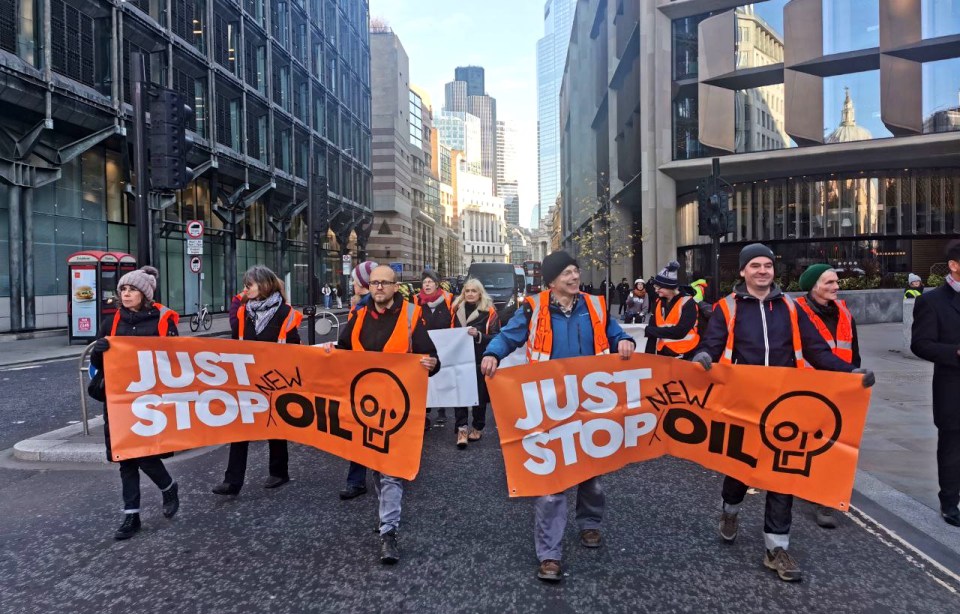 Just Stop Oil walking through the City of London, protesting
