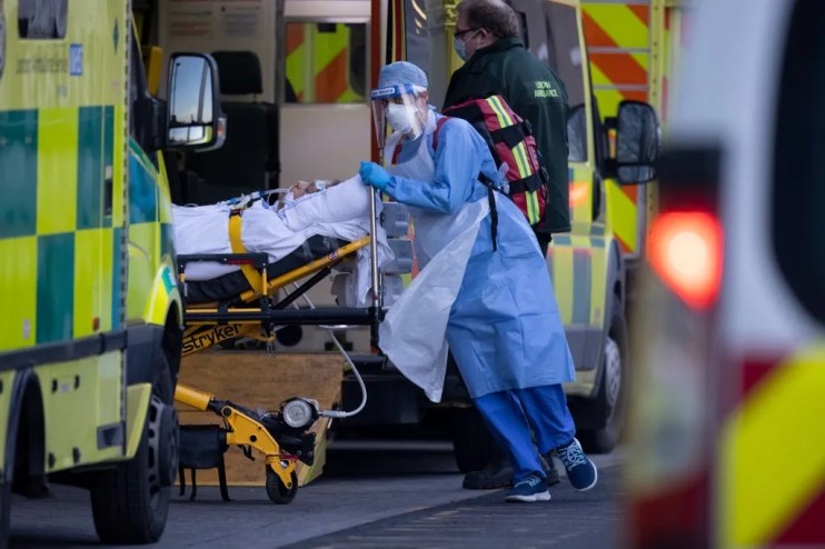 Ambulance staff with PPE during the pandemic.