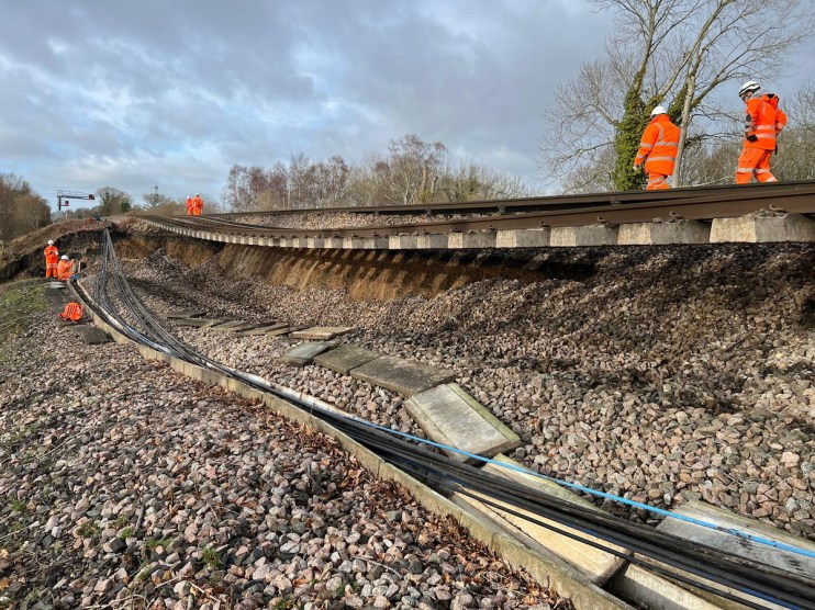Network Rail image of a 44-metre landslip which happened on the embankment to the northeast of Hook station in Hampshire on the line from London to Basingstoke. Major disruption is expected as a main railway line has collapsed in a "huge" landslip which left one track hanging in mid-air. Issue date: Sunday January 15, 2023.