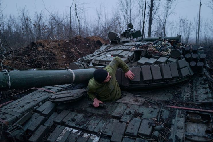 Ukrainian soldiers on a tank as they fight the Russians (Photo by Pierre Crom/Getty Images)
