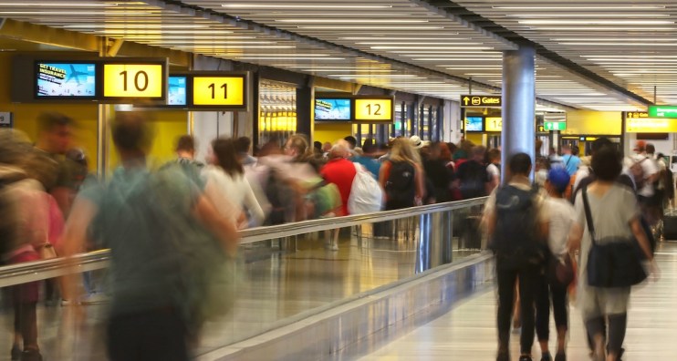 Departing passengers walking to gates in London Gatwick's South Terminal