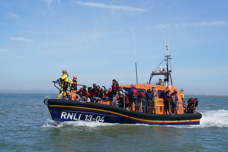 One person is missing and five others have been rescued after a small boat capsized on the River Thames near Sunbury Lock Surrey, on Friday morning (11 October)