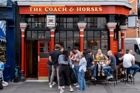 Brits heading out to Christmas parties helped drive spending in bars and pubs by 7.9 per cent in December, quashing fears that the period could be a wash out due to rail strikes.